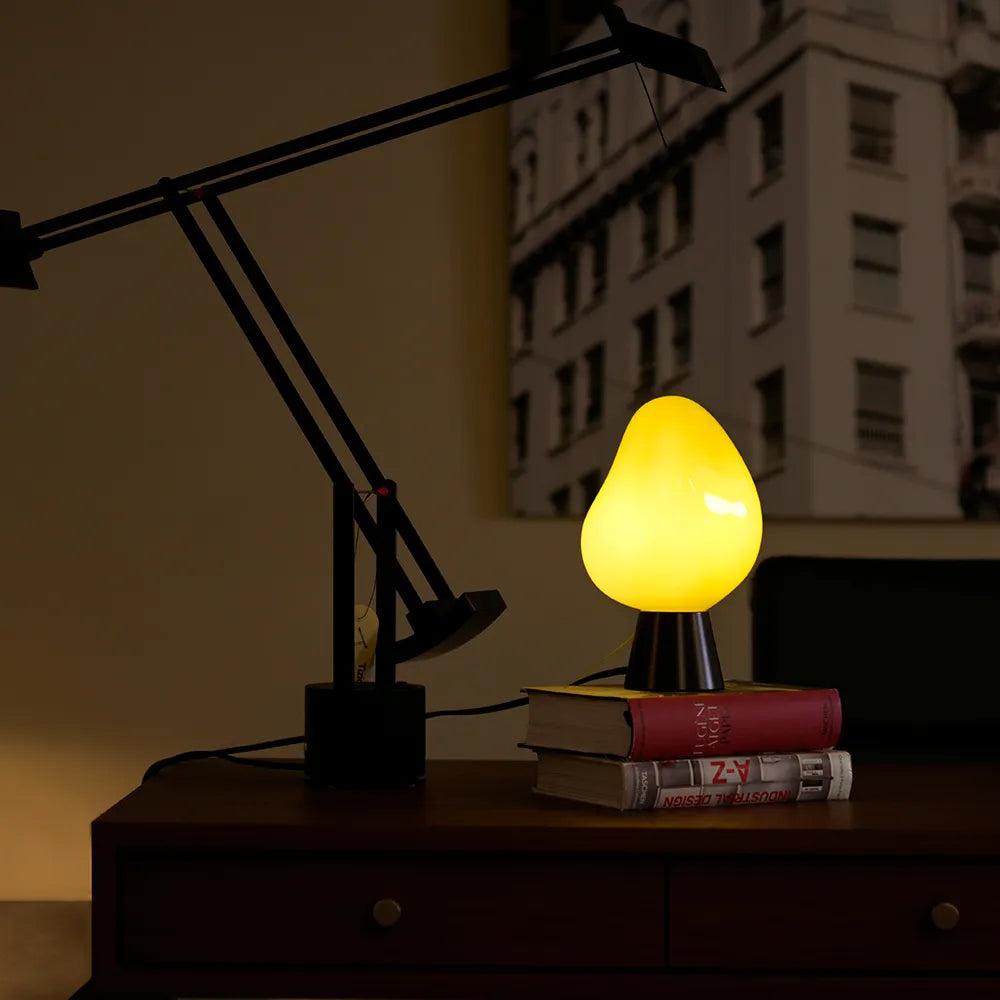 WHAUD NAMU table lamp illuminated on a desk